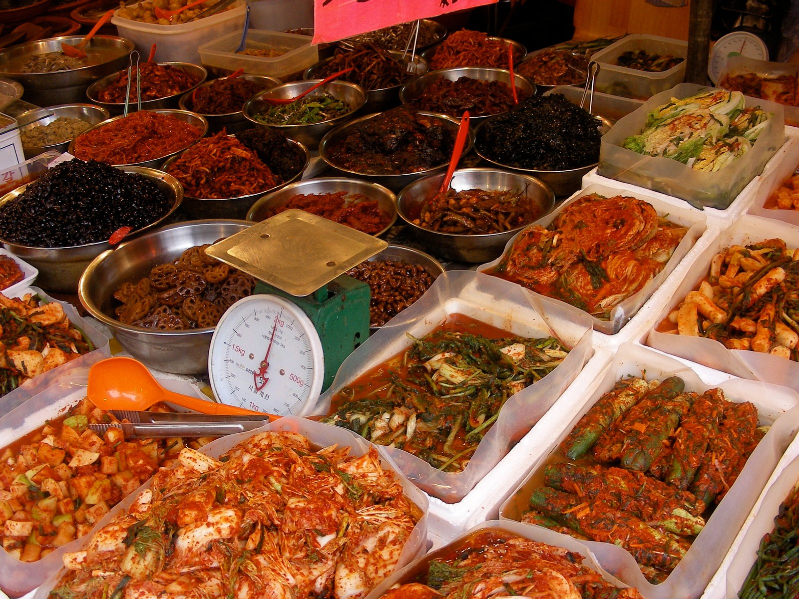 Kimchi and Korean side dishes displayed at a market in Seoul