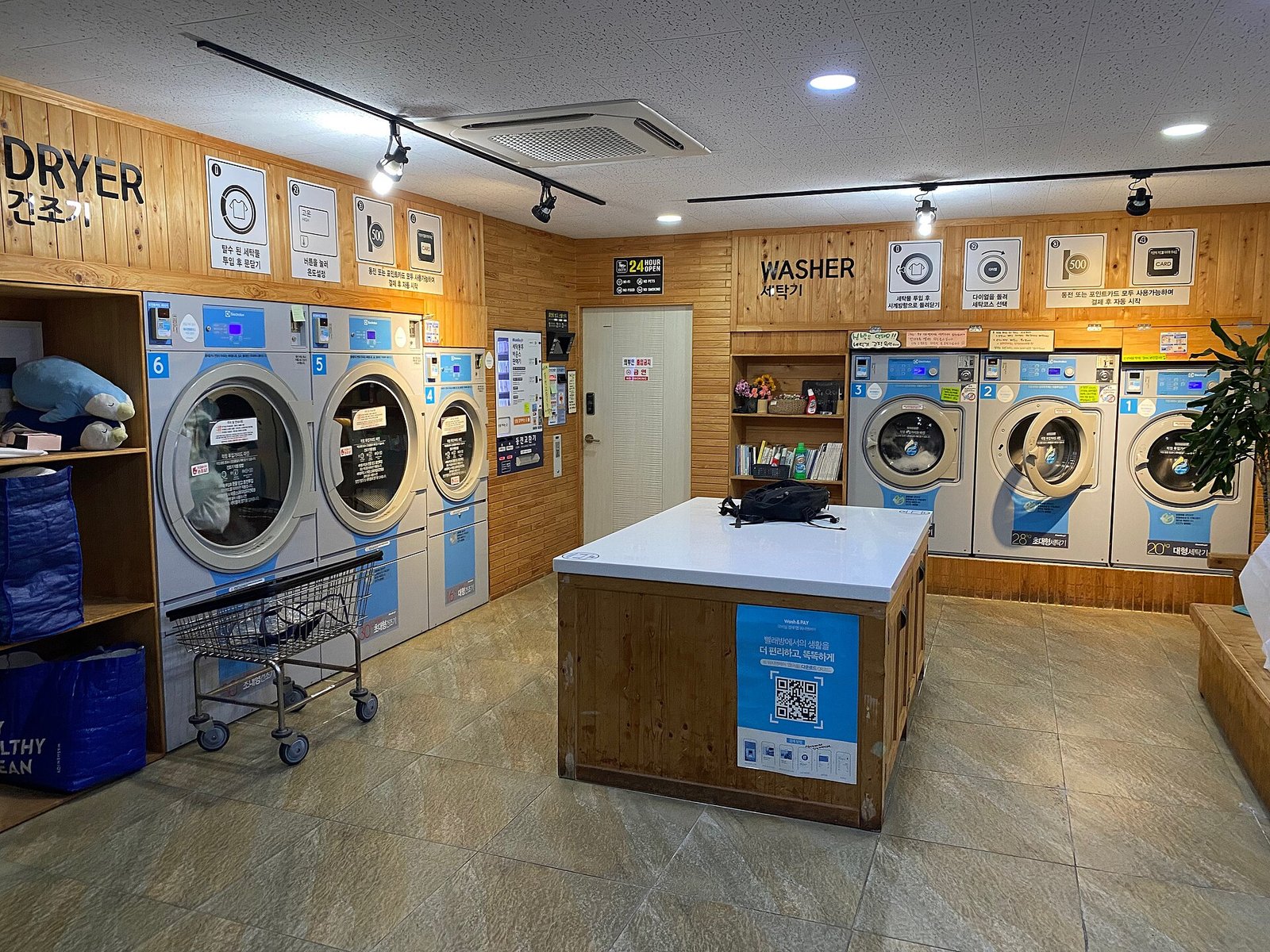 Interior of a self-service laundromat in Jeju, South Korea